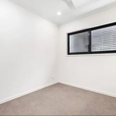 This stunning 3-bedroom, 2-bathroom townhouse in a boutique complex is now available for lease. - Photo 1