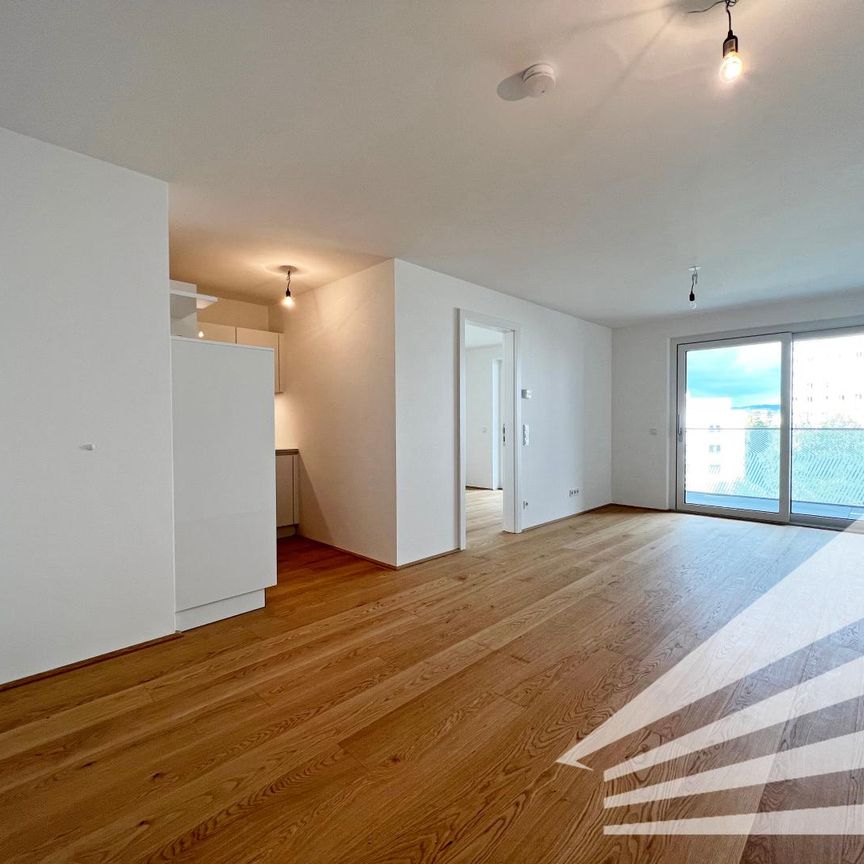 Exklusive 2 Zimmer-Neubauwohnung mit Küche und großem Balkon im KAIfive an der Donaulände - Foto 1