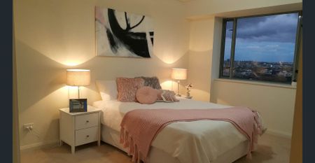 The Peak -Unfurnished Two bedroom apartment with city and water views - Photo 2