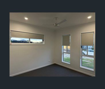 Modern Family Comfort in the Heart of Logan Reserve - Photo 2