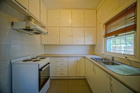 Spacious 3-Bedroom Home with Yard & Parking - Photo 2