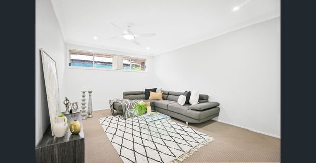 Modern Family Living in a Prime Quakers Hill Location - Photo 1