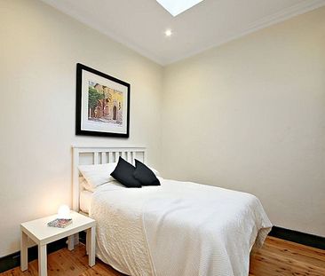 Ultra Convenient and Charming Two-Bedroom Home - Photo 6