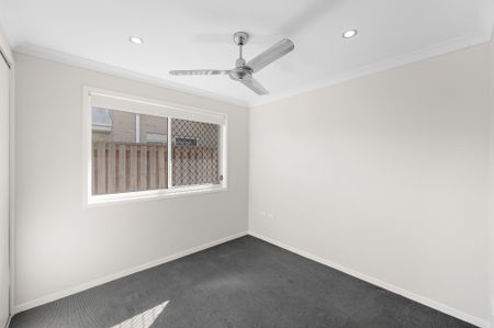 EASY LIVING ON HARMONY DRIVE - FRESH, BRIGHT, AND MOVE-IN READY AT A REDUCED PRICE! - Photo 2