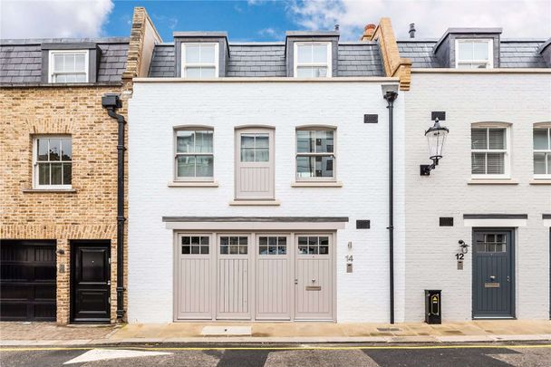 This beautifully refurbished three bedroom mews house is located close to the amenities of Sloane Square and Knightsbridge - Photo 1