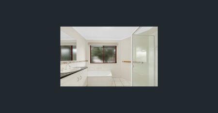 Two-bedroom low-set brick unit offering comfort, privacy, and convenience - Photo 5