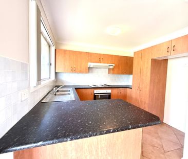 Neat and tidy 3 bedroom home with Split system air conditioning! - Photo 6