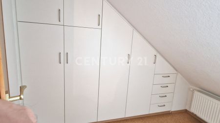 Gemütliche Dachgeschosswohnung mit Einbauküche - Foto 4