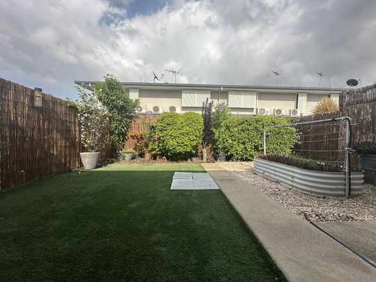 Modern unit in secure gated complex - Photo 1