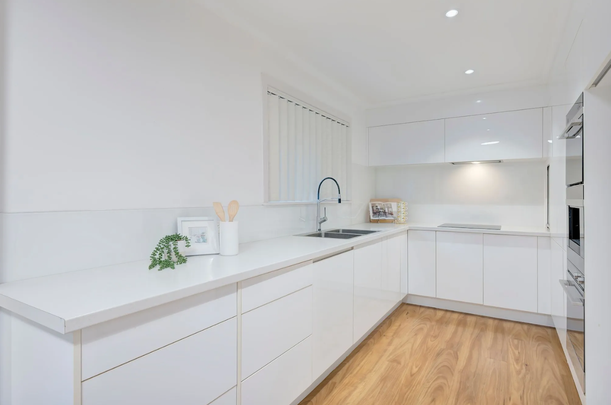 Light-Filled Family Home with Entertainer's Deck & Parkside Position! - Photo 1