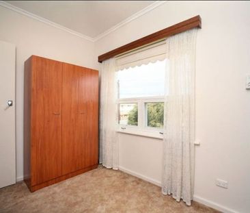 Stylish 2 Bedroom Unit with Balcony - Photo 2