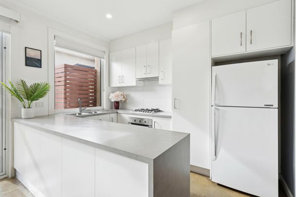 Stylish Townhouse in Super Convenient Location! - Photo 1