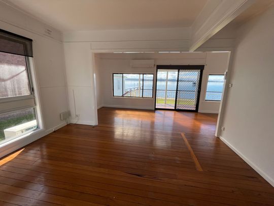 Lakeside Living - Spacious 4 Bedroom Home with Stunning Views - Photo 1