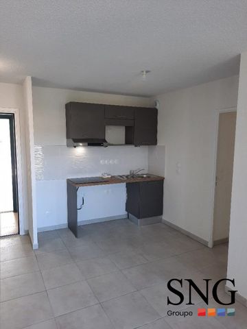 T2 AVEC LOGGIA ET DEUX PARKINGS COUVERTS - Photo 3