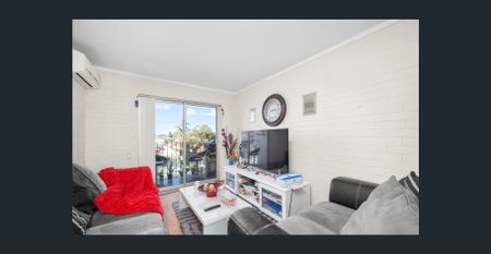 Charming 2-Bedroom, 1-Bathroom Unit for Rent - Photo 3