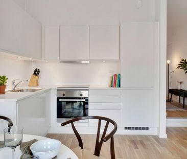 Stilfuld 2-værelses lejlighed med egen terrasse og stor stue - Foto 6