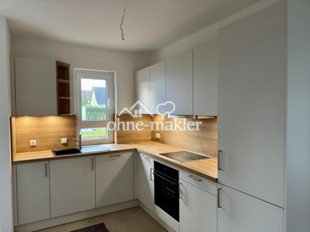 Erstbezug: Helle 3-Zimmer Wohnung mit Einbauküche, Terrasse, Garten und Stellplatz - Photo 3