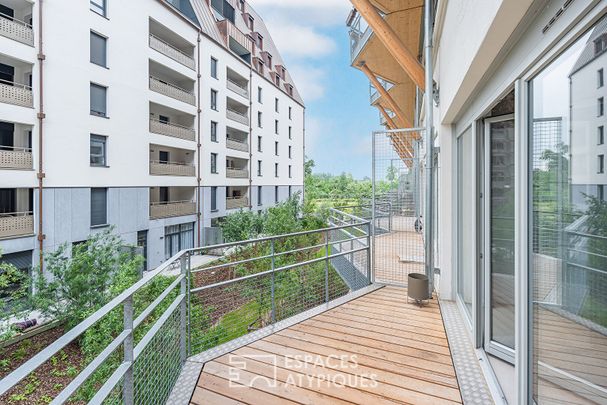 Duplex et sa terrasse au coeur des Deux Rives - Photo 1