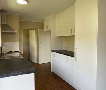 Neat and Tidy Three Bedroom - Photo 2