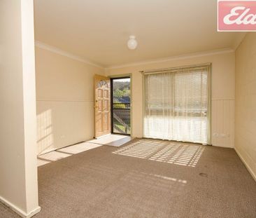 Affordable two bedroom unit. - Photo 2