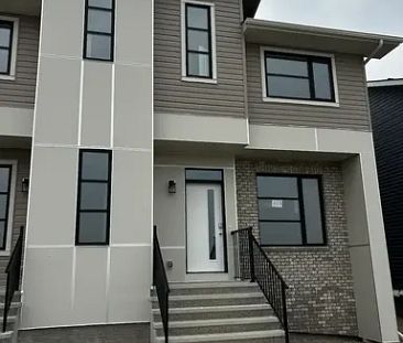 BRAND NEW MODERN 3 BEDROOM, 2.5 BATH DUPLEX IN LIVINGSTON, NW | Calgary - Photo 1