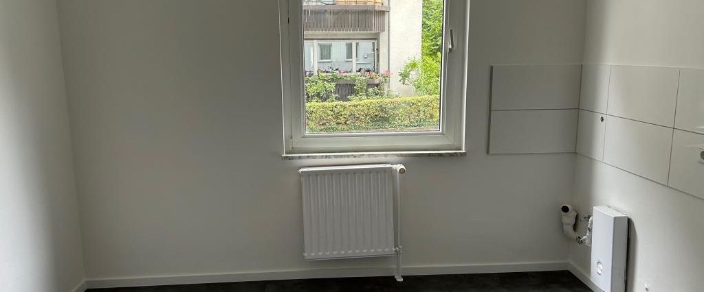 Teilrenovierte 2-Zimmer-Wohnung im Erdgeschoss - Foto 1