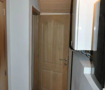 Gelijkvloers appartement met omheind tuintje en tuinhuis - Photo 2