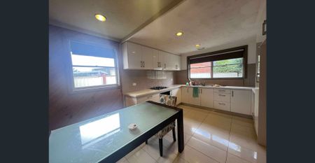 CHARMING FAMILY HOME IN A QUITE POCKET OF SUNSHINE WEST - Photo 5