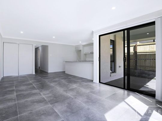 QUIET ESCAPE IN WEST END! A MUST INSPECT! - Photo 1