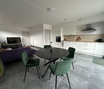 Prima gelijkvloers appartement met tuin en twee staanplaatsen! - Photo 5