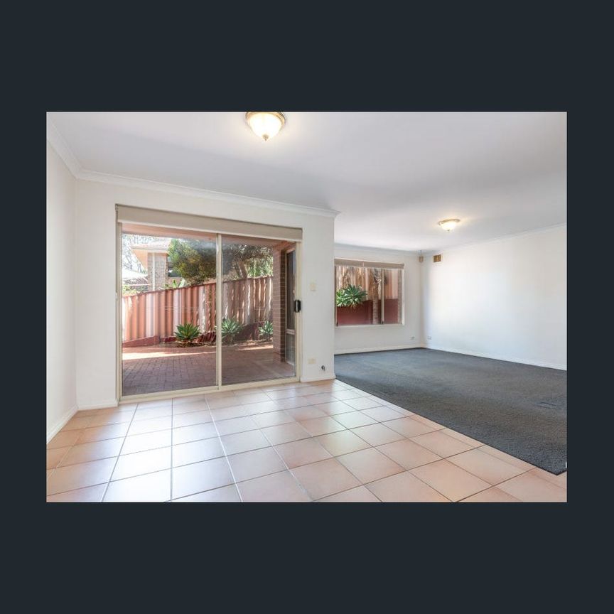 COASTAL TRANQUILLITY AND CONVENIENCE! - Photo 1