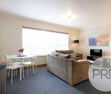 Perfectly Located FULLY FURNISHED Unit - Photo 1