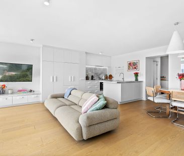 Architecturally Re-Designed Apartment with Northern Harbour Views - Photo 2