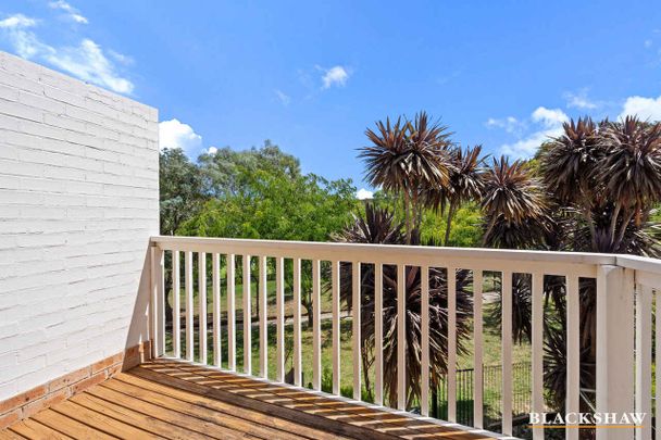 Stylish 3-Bedroom Townhouse with Golf Course Views & EV Charging - Photo 1