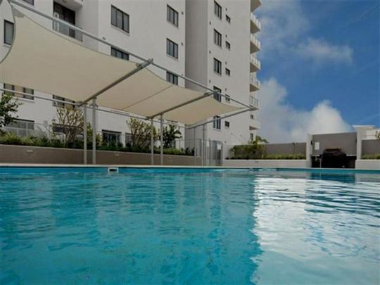 Beautiful Apartment with Ocean Views &plus; Pool & Gym - Photo 1