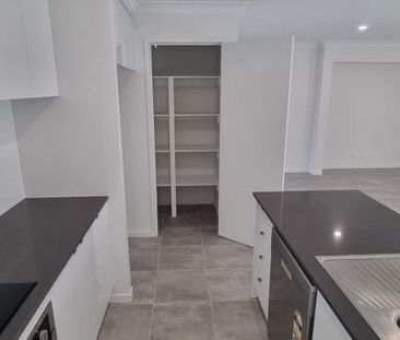 Modern Four-Bedroom Home in Holmview - Photo 6