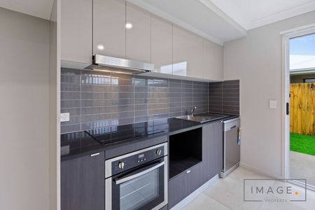 HOME IN FAMILY-FOCUSED ESTATE - Photo 4