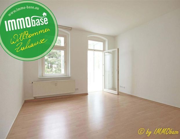 Wohnen mit Wintergarten und Einbauküche! - Foto 1