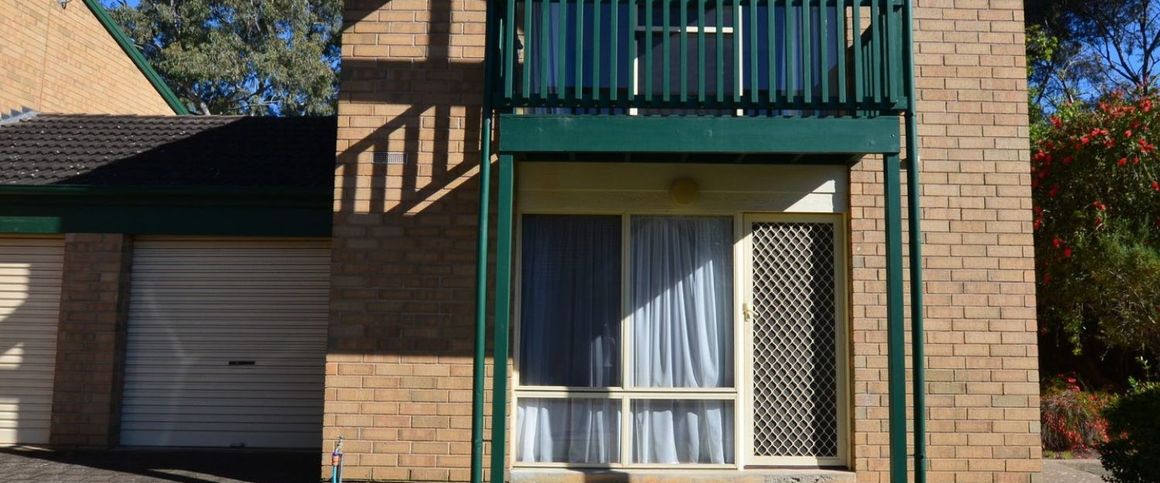 Open the Door to Contemporary Convenience in a Prime Marden Location - Photo 1