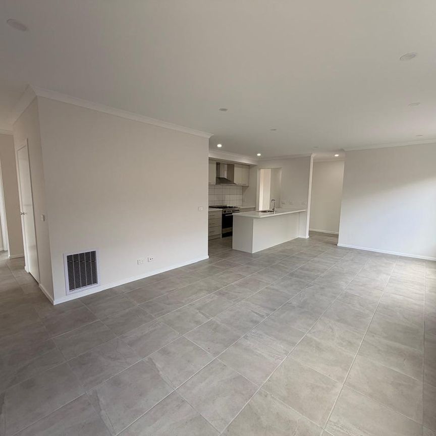 BRAND NEW FAMILY HOME IN A CONVENIENT CLYDE NORTH LOCATION! - Photo 1