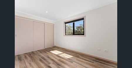 Modern living with bush views - Photo 4