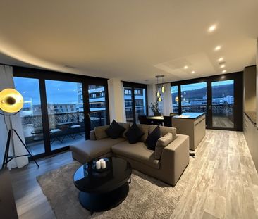 Modern 2.5-room apartment with balcony and panoramic view in Dübendorf - Foto 1