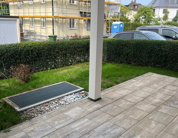 Großzügige Erdgeschosswohnung mit Garten – Wohnen wie im Haus - Photo 1
