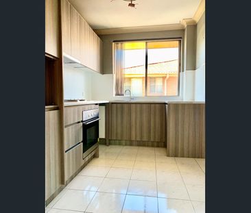 SPACIOUS APARTMENT WITH ACCESS TO POOL & GYM - Photo 2