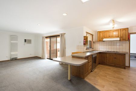 Three Bedroom, Two Bathroom, Two Living in Quiet Location - Photo 4