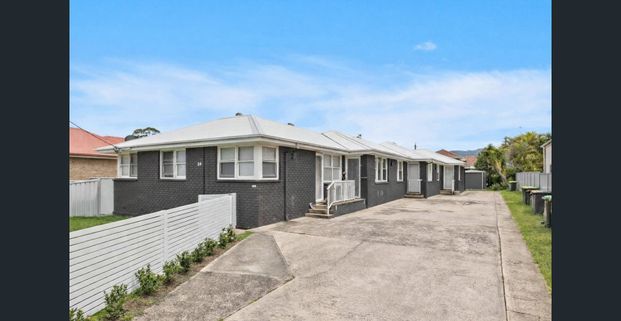 Stylishly renovated coastal retreat - Photo 1