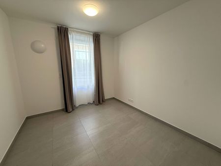 Nieuwbouwappartement met 3 slaapkamers, groot terras en autostaanplaats te huur in centrum Leuven - Photo 2