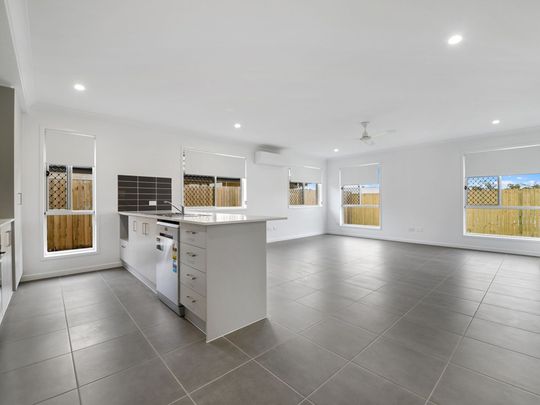 Spacious and Modern Living: 4-Bedroom Family Home with Double Garage. - Photo 1