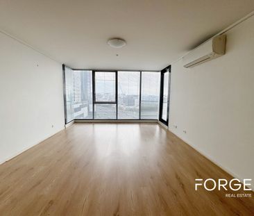 Modern 12th Floor Sanctuary with Dual Balconies & Floorboards - Photo 1