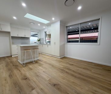 Beautifully Renovated 3-Bedroom Home - Photo 5